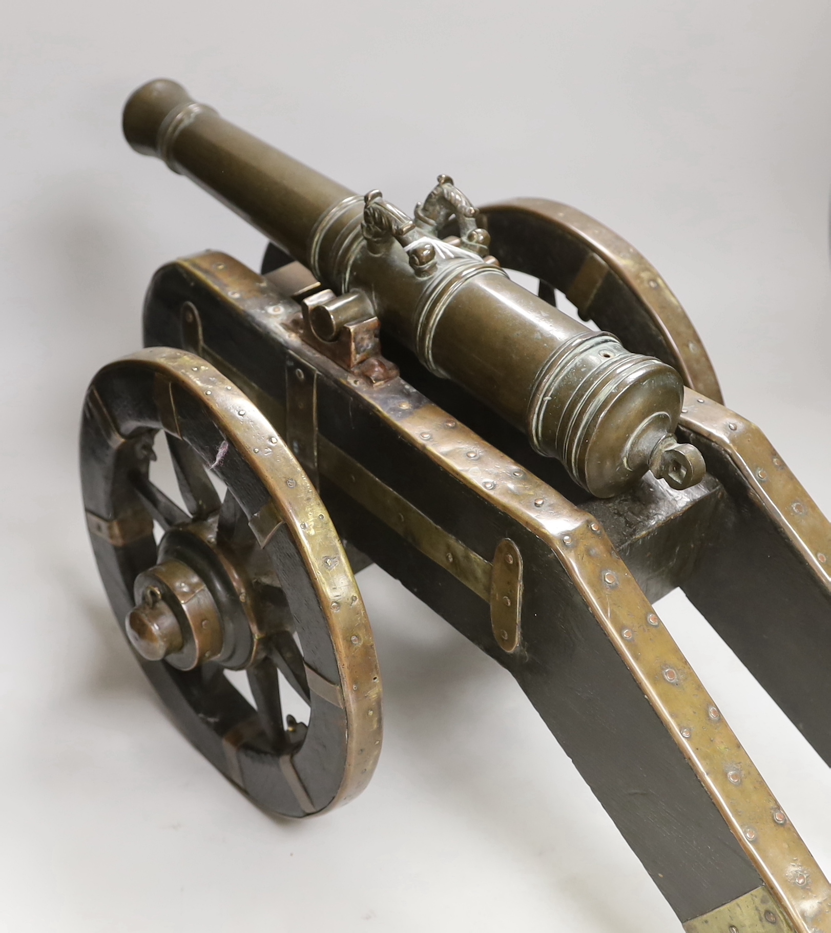 A bronze starting canon and truck, barrel 37cm